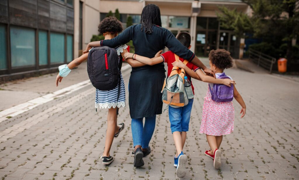 Teacher with students