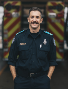 Steve Jones wearing his fire fighter uniform